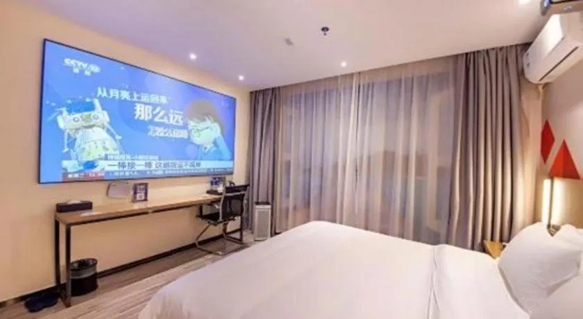 Bed in Borrman Hotel Guilin High-speed Railway North Station Evergrande Plaza