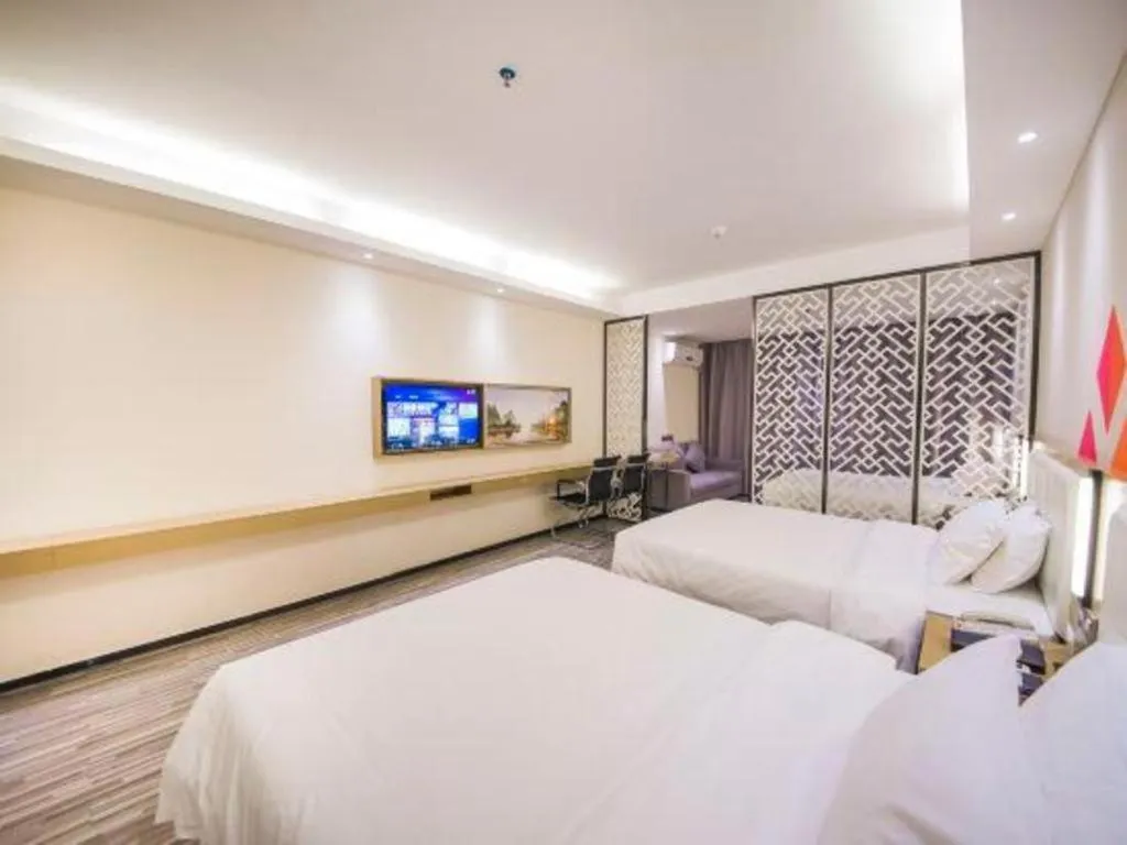 Bed in Borrman Hotel Guilin High-speed Railway North Station Evergrande Plaza