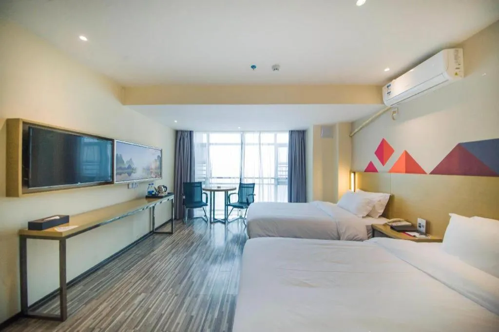 Bed in Borrman Hotel Guilin High-speed Railway North Station Evergrande Plaza