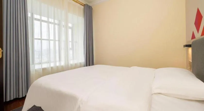 Bed in Borrman Hotel Guilin High-speed Railway North Station Evergrande Plaza