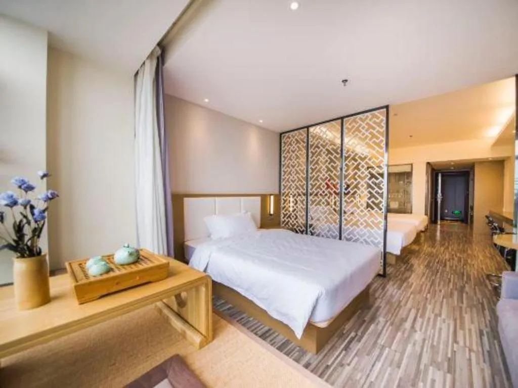 Bed in Borrman Hotel Guilin High-speed Railway North Station Evergrande Plaza
