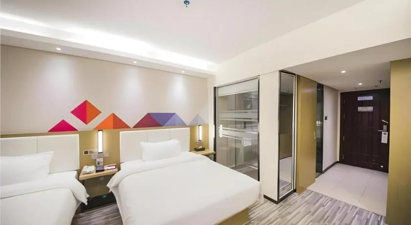 Bed in Borrman Hotel Guilin High-speed Railway North Station Evergrande Plaza