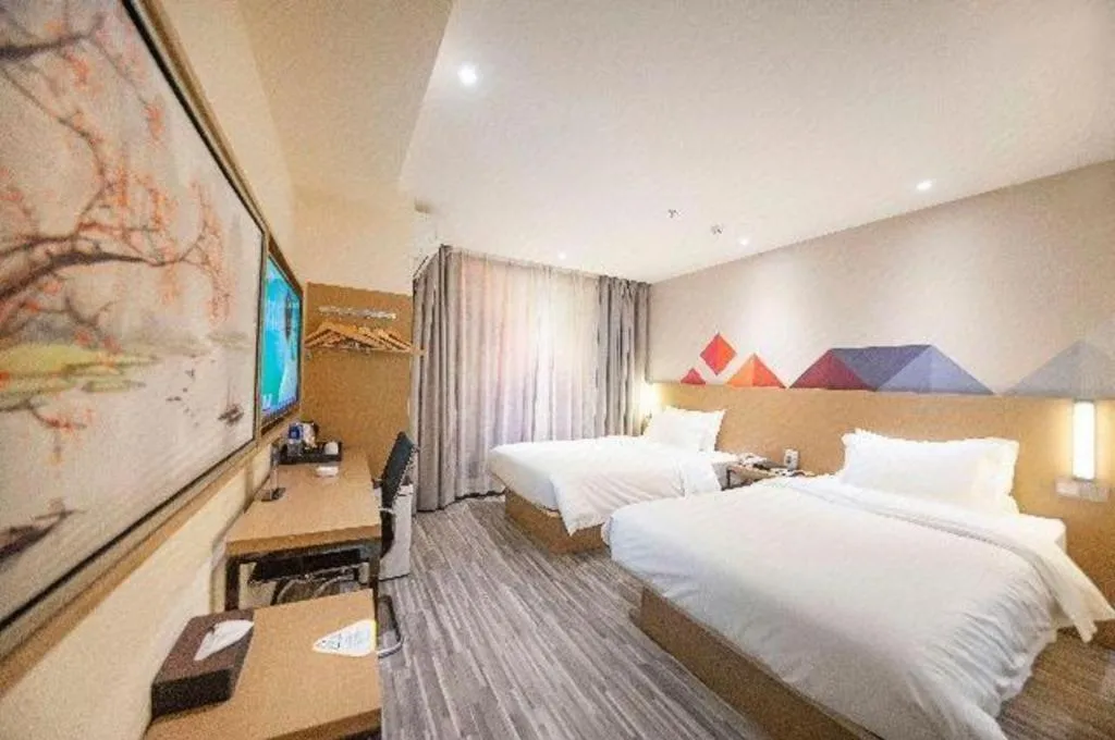 Bed in Borrman Hotel Guilin High-speed Railway North Station Evergrande Plaza