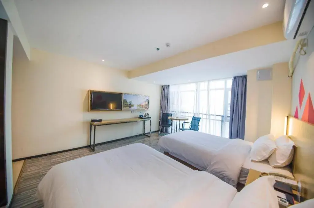 Bed in Borrman Hotel Guilin High-speed Railway North Station Evergrande Plaza Bed in Borrman Hotel Guilin High-speed Railway North Station Evergrande Plaza