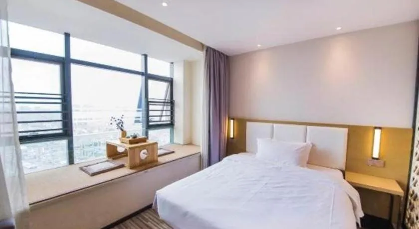 Bed in Borrman Hotel Guilin High-speed Railway North Station Evergrande Plaza