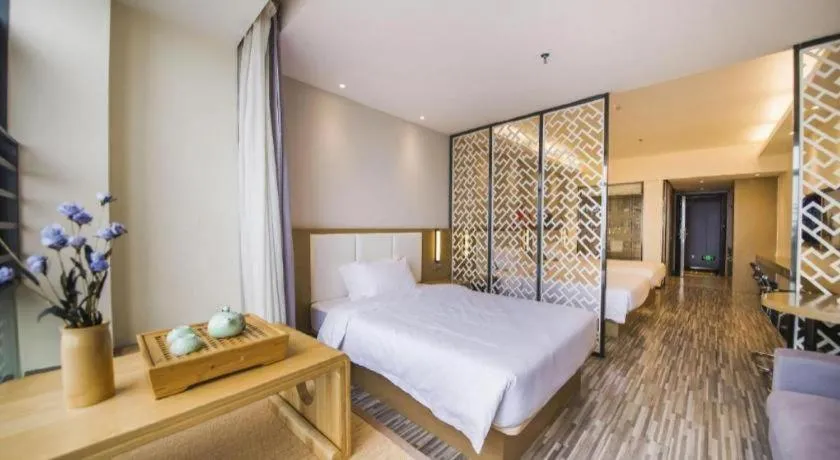 Bed in Borrman Hotel Guilin High-speed Railway North Station Evergrande Plaza