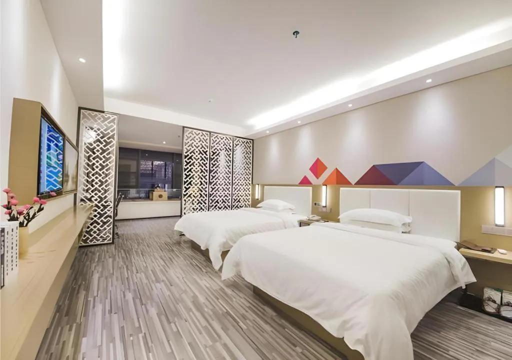 Bed in Borrman Hotel Guilin High-speed Railway North Station Evergrande Plaza