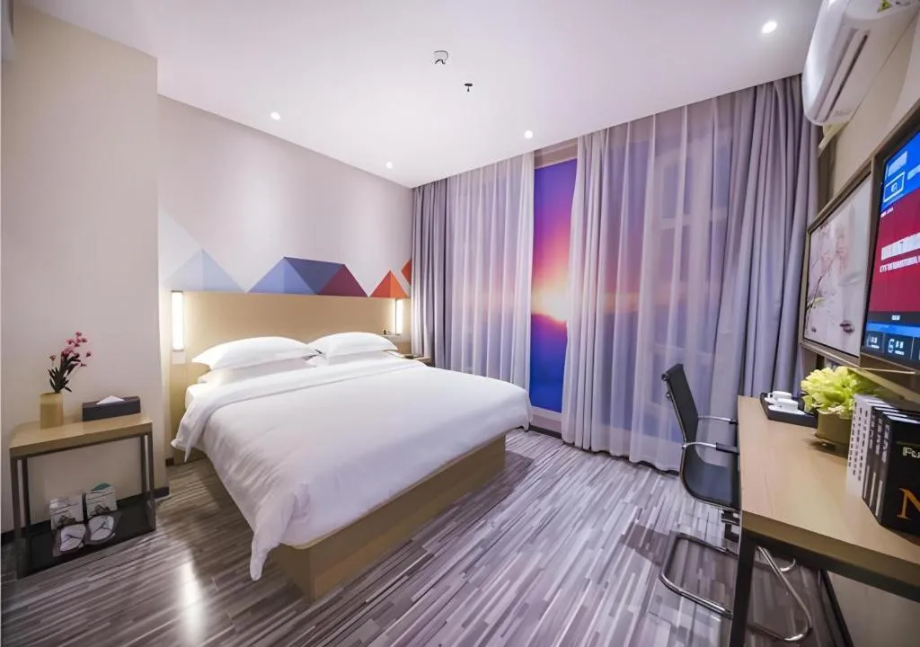 Bed in Borrman Hotel Guilin High-speed Railway North Station Evergrande Plaza