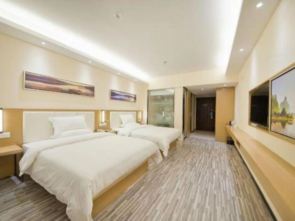 Bed in Borrman Hotel Guilin High-speed Railway North Station Evergrande Plaza
