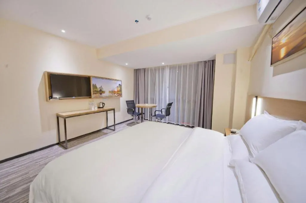 Bed in Borrman Hotel Guilin High-speed Railway North Station Evergrande Plaza