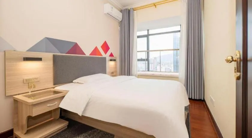 Bed in Borrman Hotel Guilin High-speed Railway North Station Evergrande Plaza
