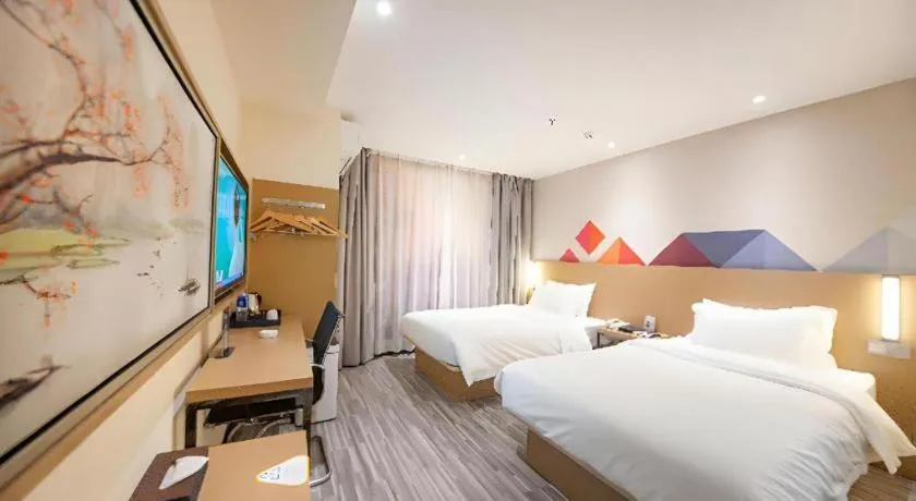 Bed in Borrman Hotel Guilin High-speed Railway North Station Evergrande Plaza