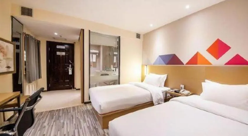 Bed in Borrman Hotel Guilin High-speed Railway North Station Evergrande Plaza
