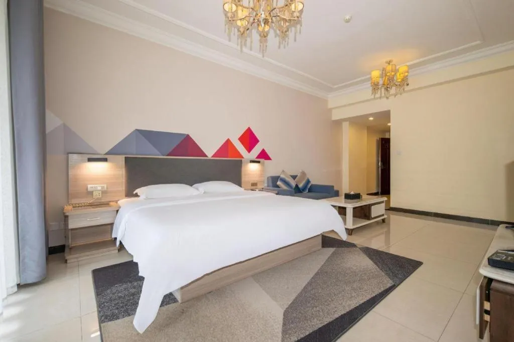 Bed in Borrman Hotel Guilin High-speed Railway North Station Evergrande Plaza