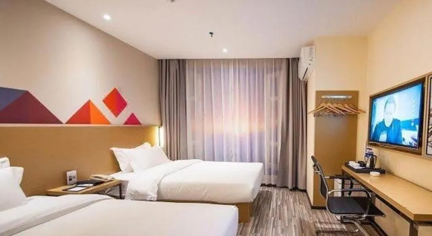 Bed in Borrman Hotel Guilin High-speed Railway North Station Evergrande Plaza