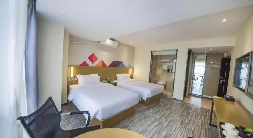 Bed in Borrman Hotel Guilin High-speed Railway North Station Evergrande Plaza