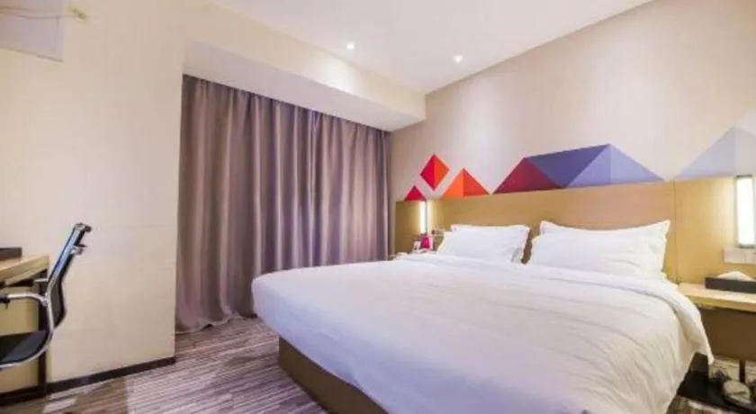 Bed in Borrman Hotel Guilin High-speed Railway North Station Evergrande Plaza