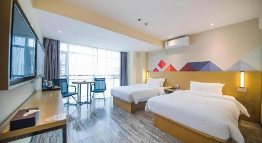 Bed in Borrman Hotel Guilin High-speed Railway North Station Evergrande Plaza