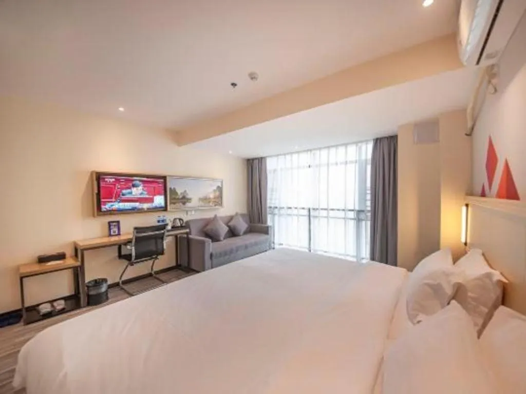 Bed in Borrman Hotel Guilin High-speed Railway North Station Evergrande Plaza