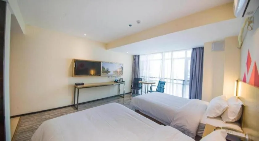 Bed in Borrman Hotel Guilin High-speed Railway North Station Evergrande Plaza