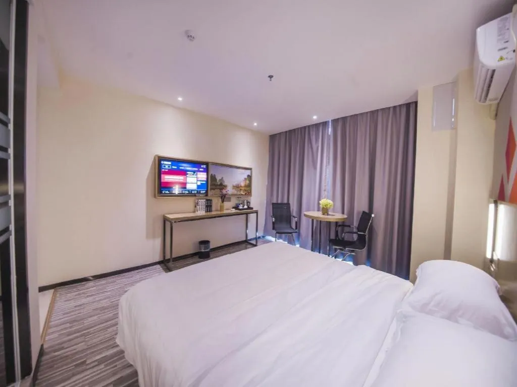 Bed in Borrman Hotel Guilin High-speed Railway North Station Evergrande Plaza