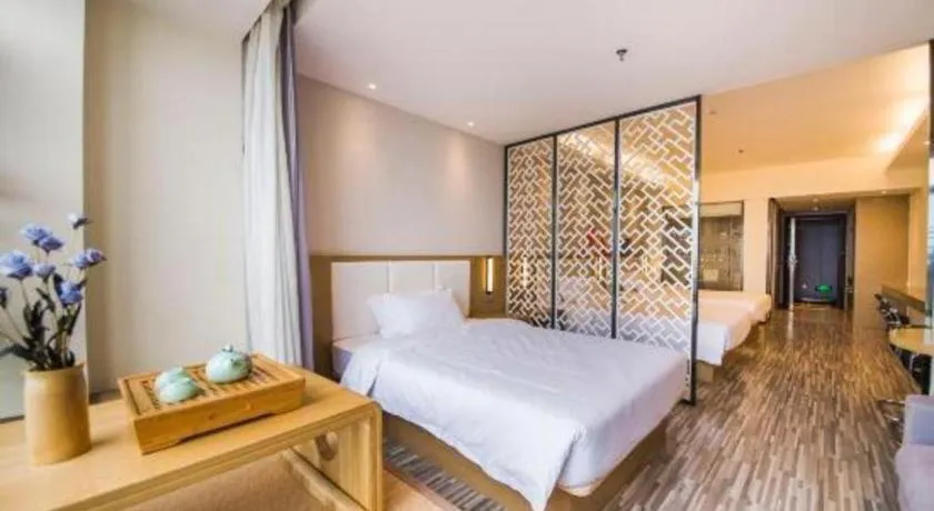 Bed in Borrman Hotel Guilin High-speed Railway North Station Evergrande Plaza