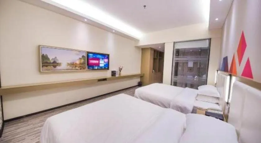 Bed in Borrman Hotel Guilin High-speed Railway North Station Evergrande Plaza