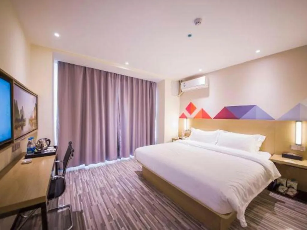 Bed in Borrman Hotel Guilin High-speed Railway North Station Evergrande Plaza