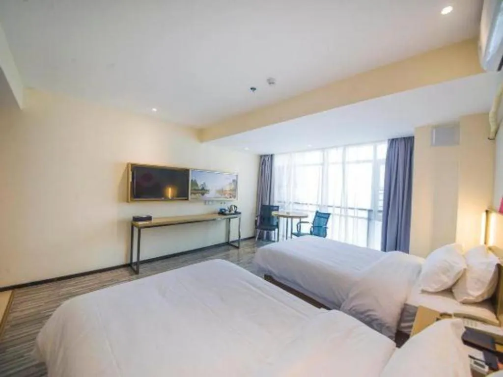 Bed in Borrman Hotel Guilin High-speed Railway North Station Evergrande Plaza