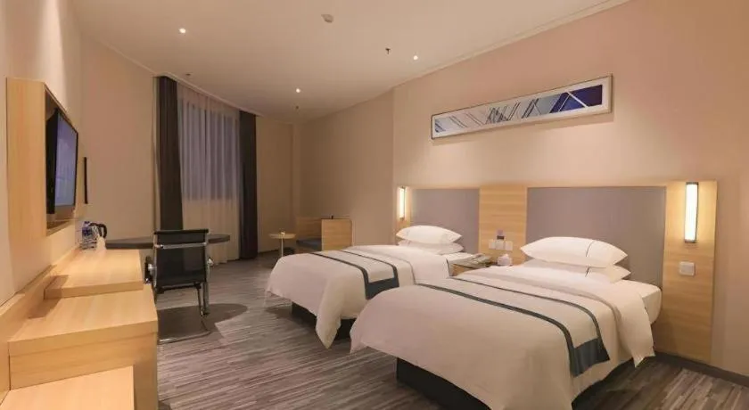 Bed in City Comfort Inn Guangzhou Luyuan Road Taojin Metro Station