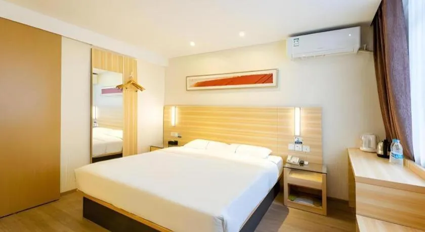 Bed in City Comfort Inn Guangzhou Luyuan Road Taojin Metro Station