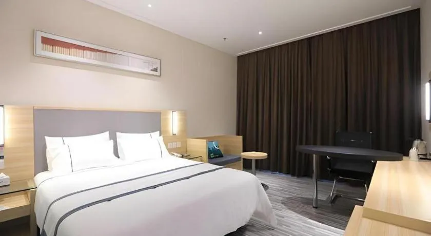 Bed in City Comfort Inn Guangzhou Luyuan Road Taojin Metro Station