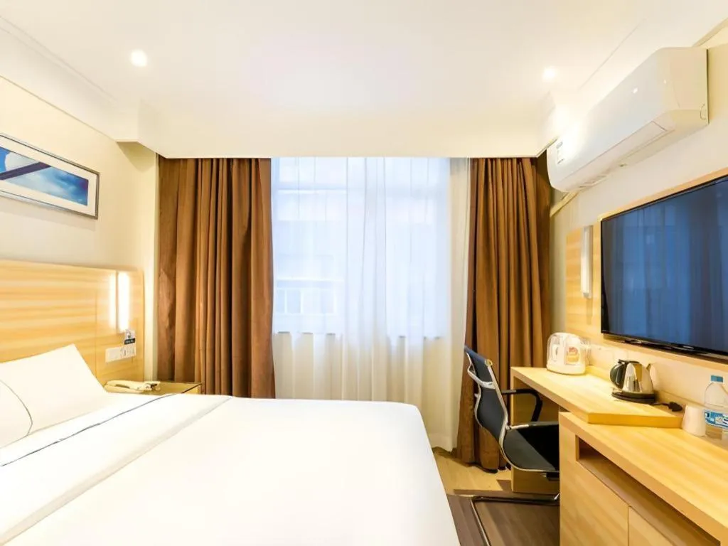 Bed in City Comfort Inn Guangzhou Luyuan Road Taojin Metro Station