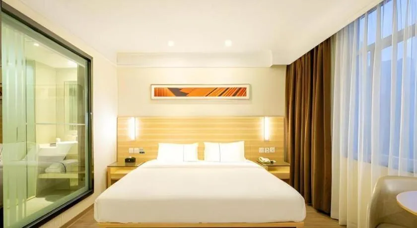 Bed in City Comfort Inn Guangzhou Luyuan Road Taojin Metro Station