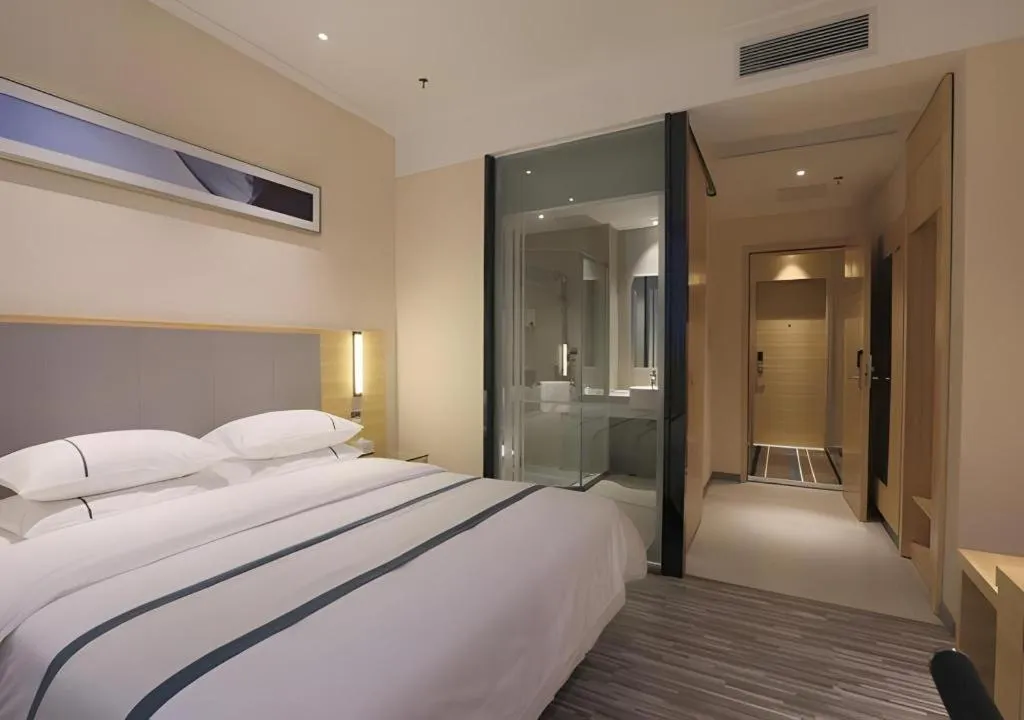 Bed in City Comfort Inn Guangzhou Luyuan Road Taojin Metro Station