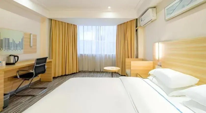 Bed in City Comfort Inn Guangzhou Luyuan Road Taojin Metro Station Bed in City Comfort Inn Guangzhou Luyuan Road Taojin Metro Station