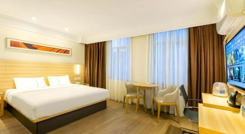 Bed in City Comfort Inn Guangzhou Luyuan Road Taojin Metro Station