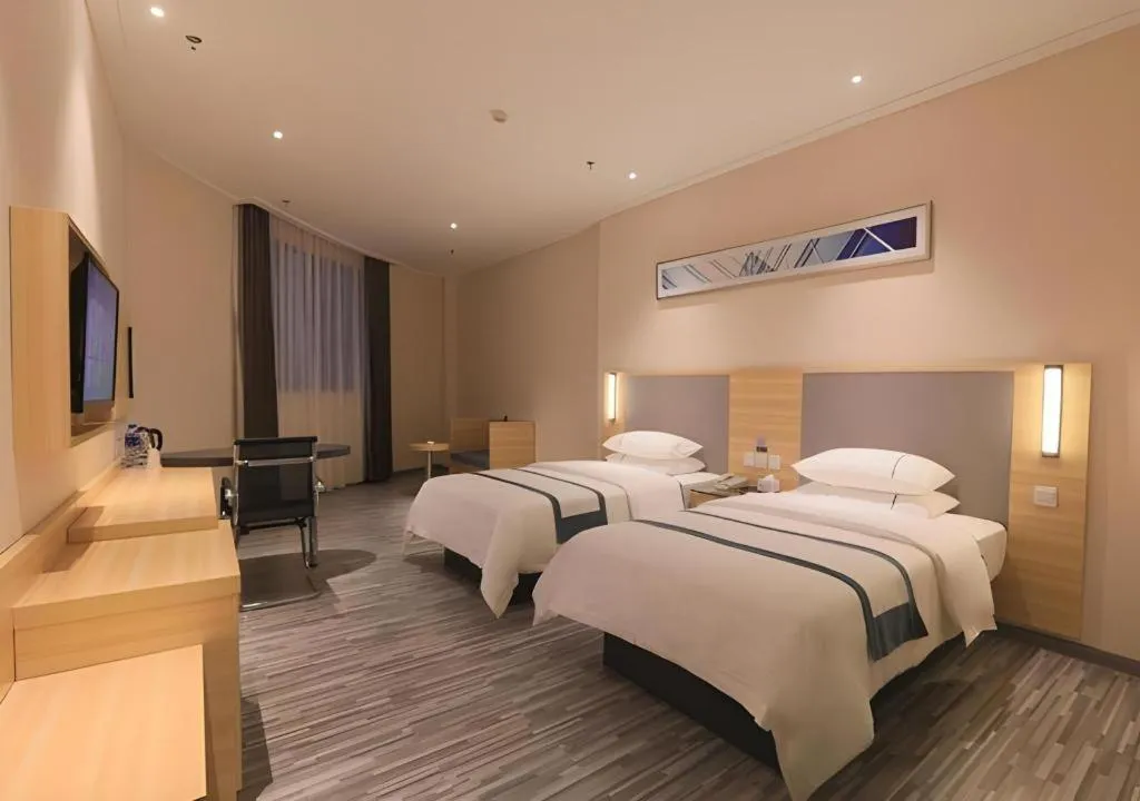 Bed in City Comfort Inn Guangzhou Luyuan Road Taojin Metro Station