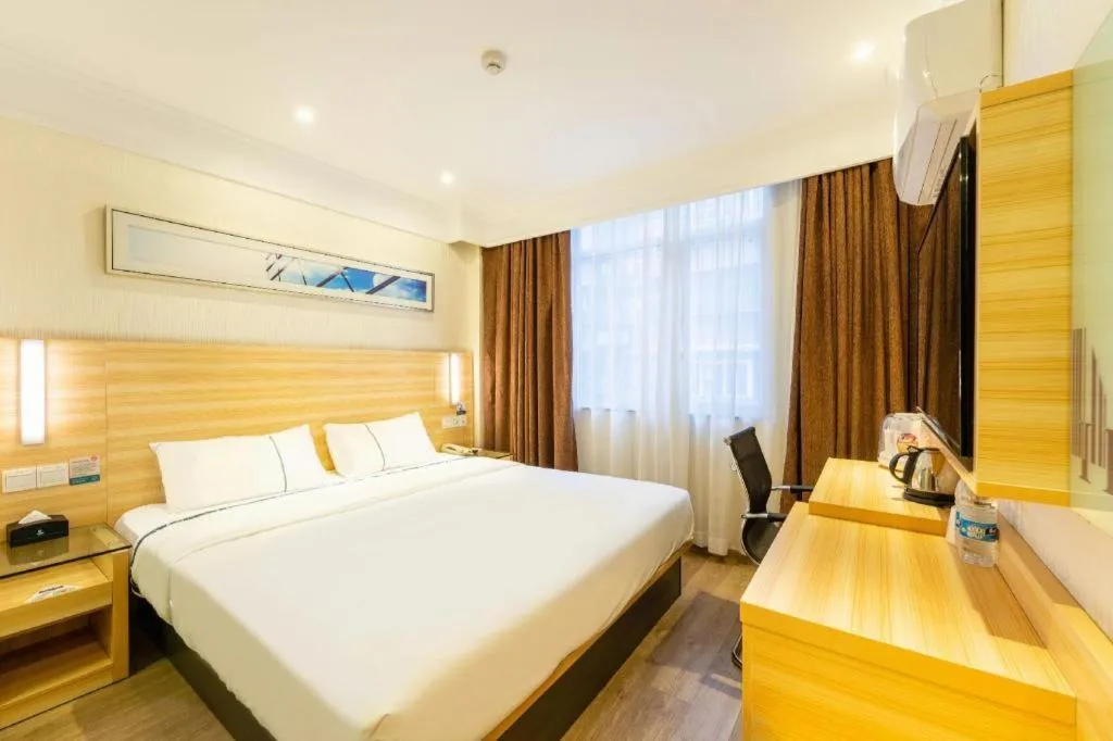 Bed in City Comfort Inn Guangzhou Luyuan Road Taojin Metro Station