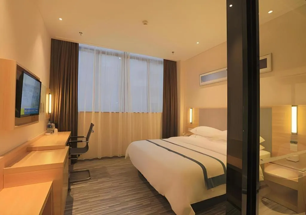 Bed in City Comfort Inn Guangzhou Luyuan Road Taojin Metro Station