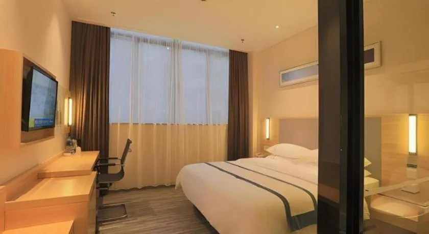 Bed in City Comfort Inn Guangzhou Luyuan Road Taojin Metro Station
