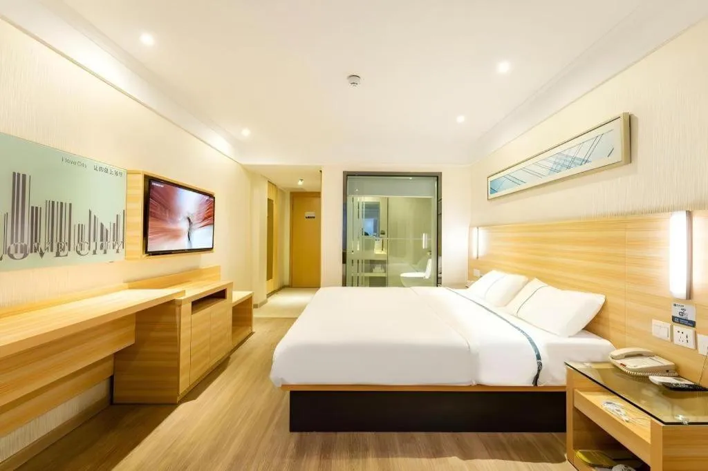 Bed in City Comfort Inn Guangzhou Luyuan Road Taojin Metro Station