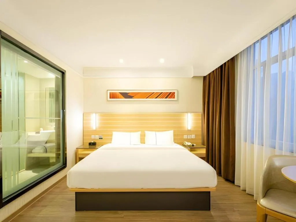 Bed in City Comfort Inn Guangzhou Luyuan Road Taojin Metro Station