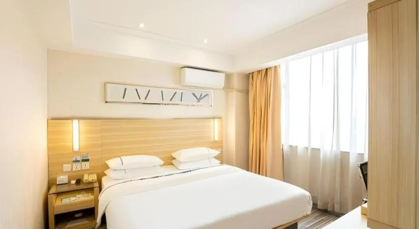 Bed in City Comfort Inn Guangzhou Luyuan Road Taojin Metro Station