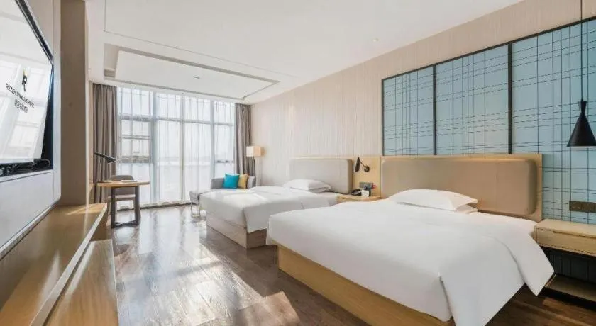 Bed in Echarm Hotel Yiyang Wanda Plaza