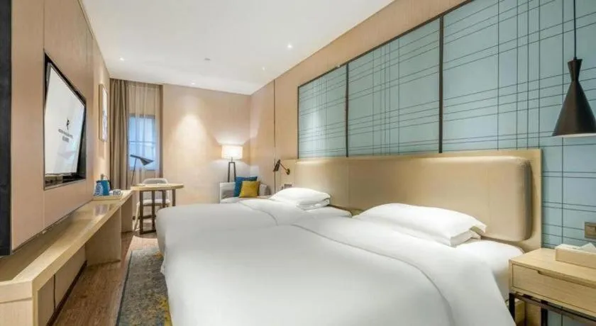 Bed in Echarm Hotel Yiyang Wanda Plaza