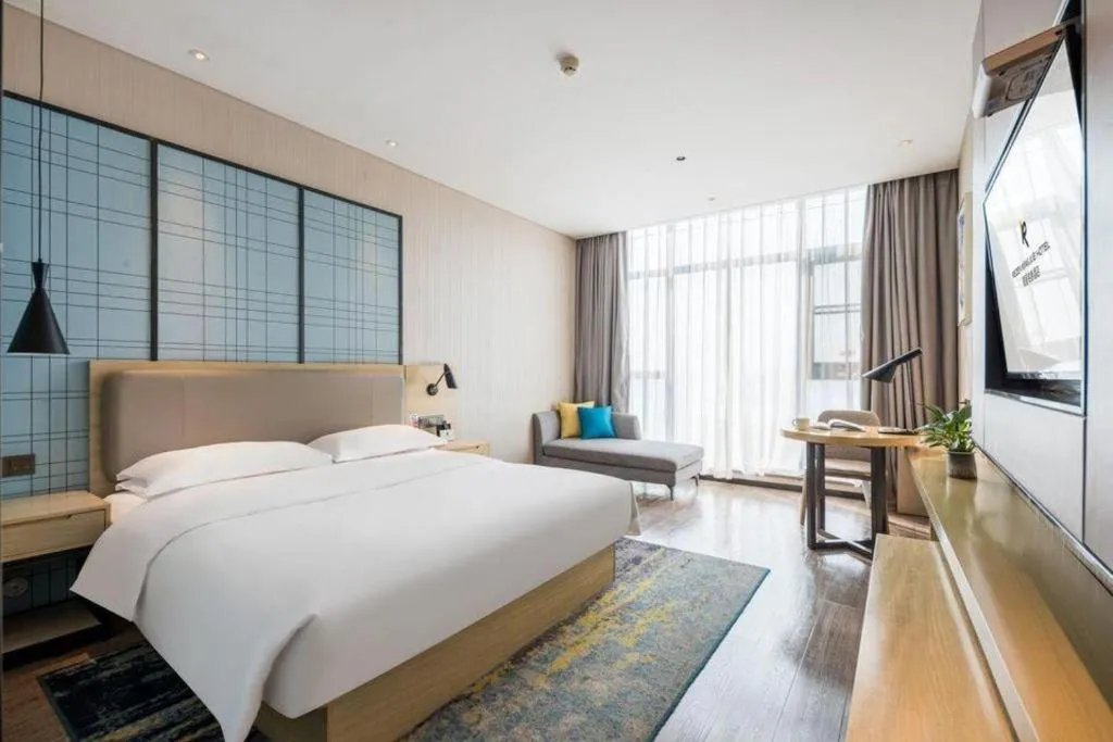 Bed in Echarm Hotel Yiyang Wanda Plaza