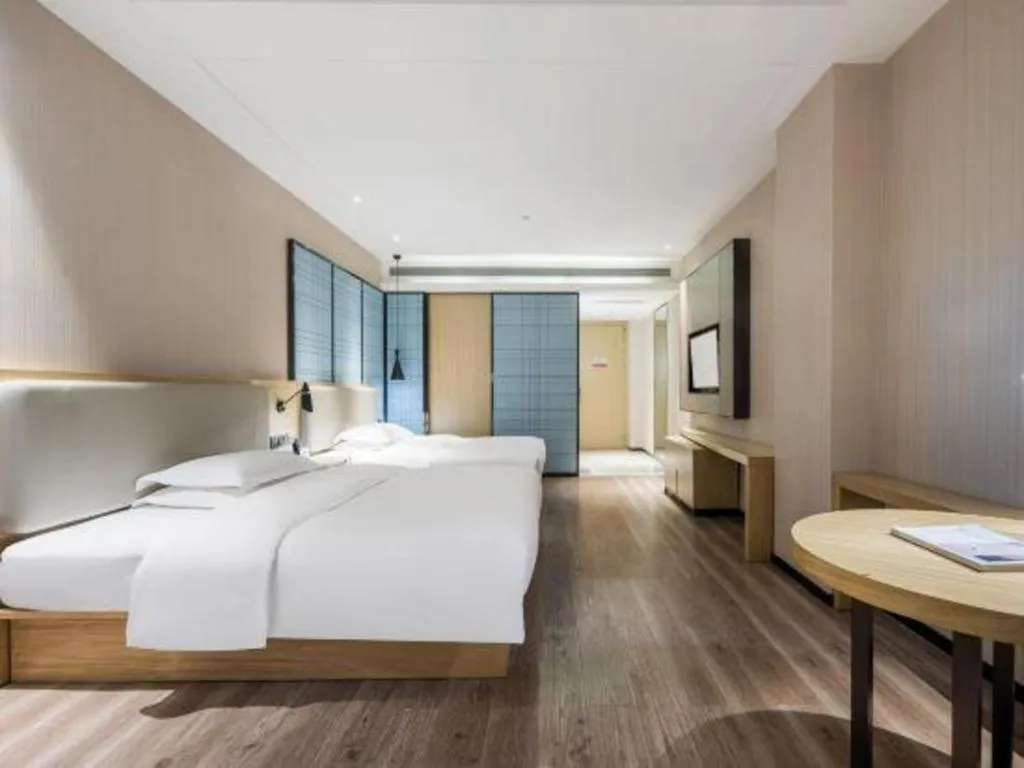Bed in Echarm Hotel Yiyang Wanda Plaza
