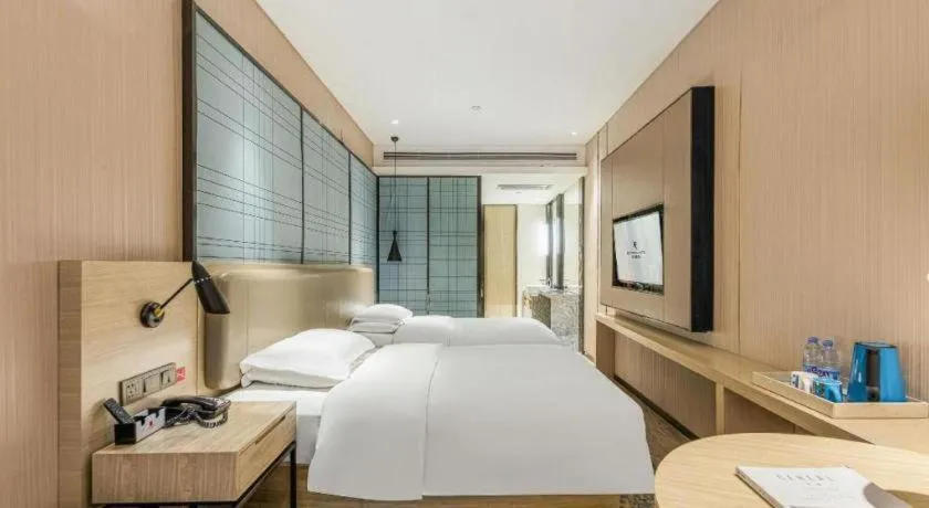 Bed in Echarm Hotel Yiyang Wanda Plaza
