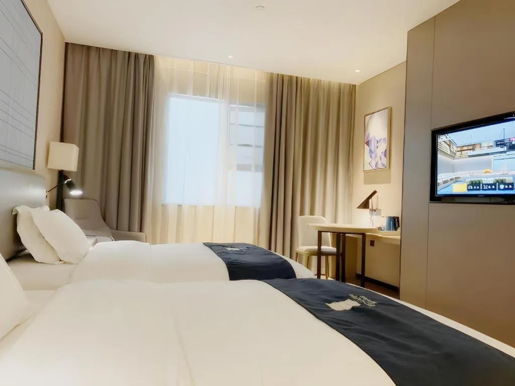 Bed in Echarm Hotel Yiyang Wanda Plaza